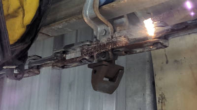 Laser cleaning rusty industrial chain